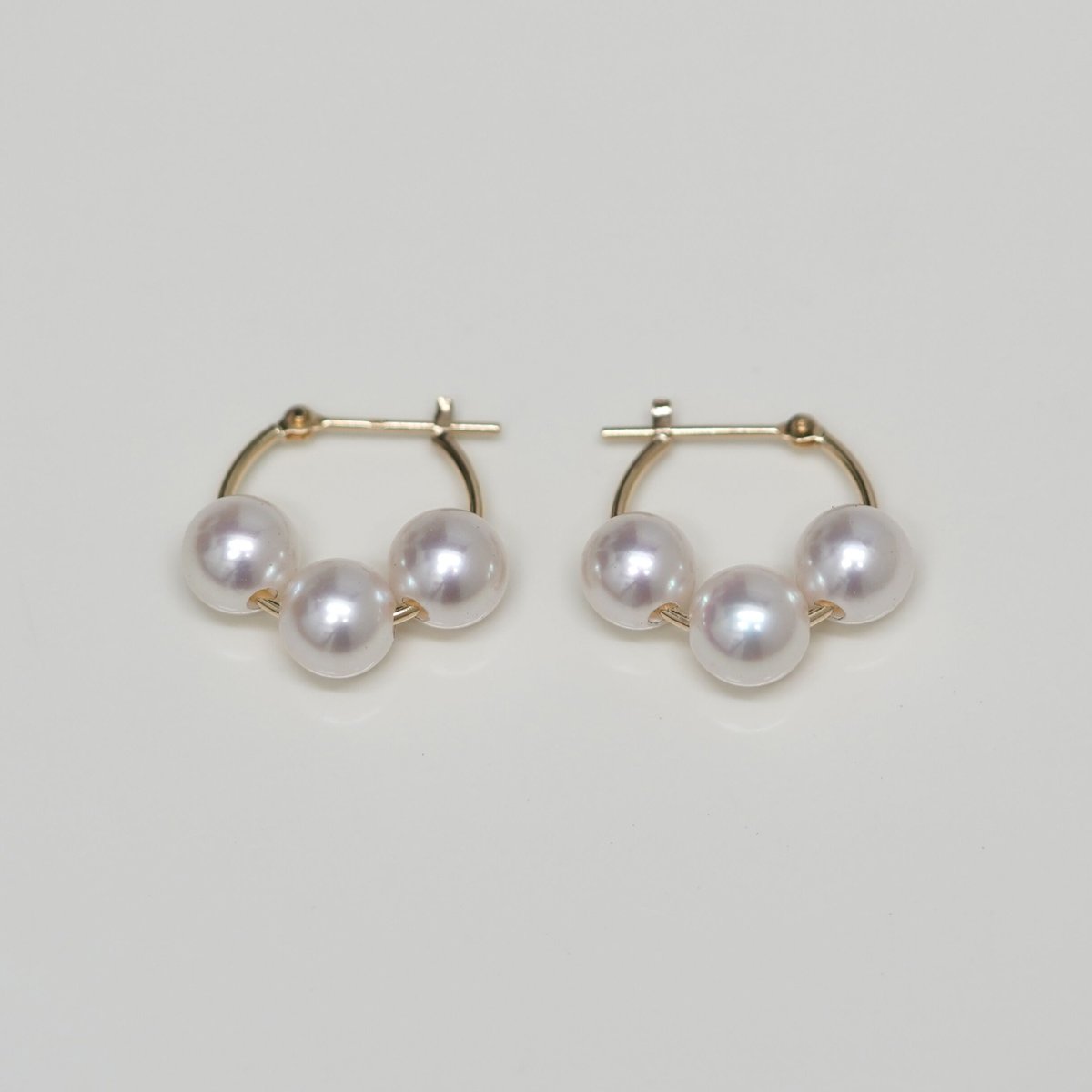 Pearl 3 crossing pierced earrings / パール 3 クロッシン Pearl 3 crossing pierced earrings / パール 3 クロッシン