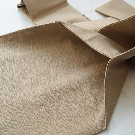 【なごや帯】縮緬地　三角更紗文　なごや帯