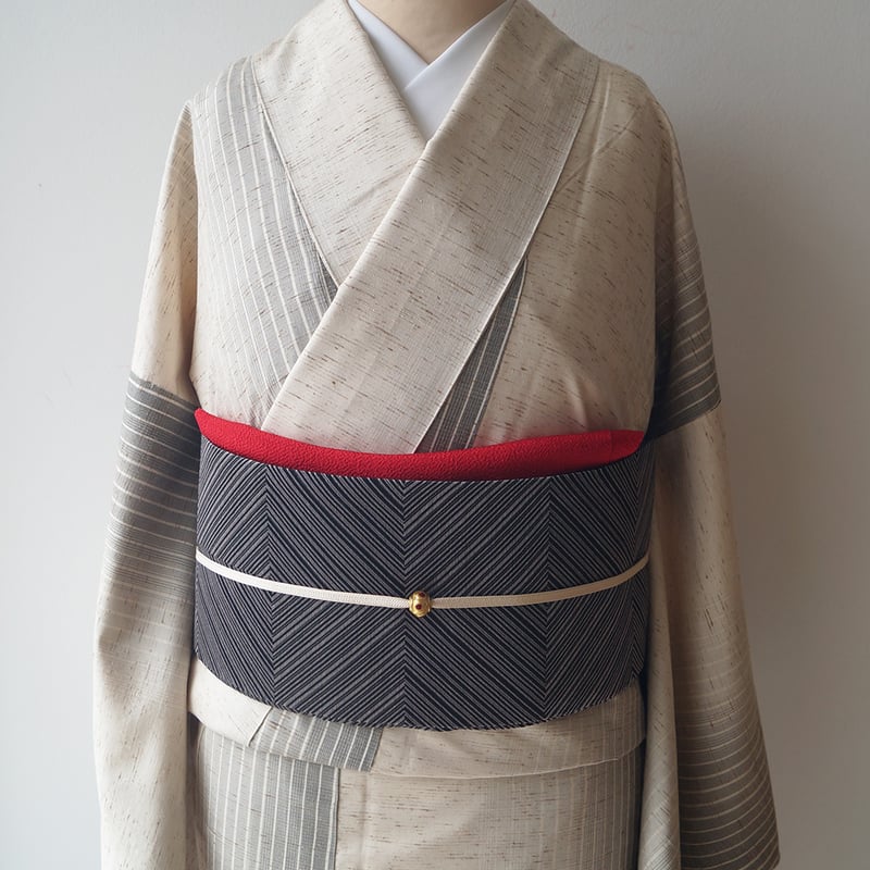 正絹ぜんまい紬 新品 単衣 縦縞 着物“想いを綴って絣を紡ぎ風の軌跡に縞を引く