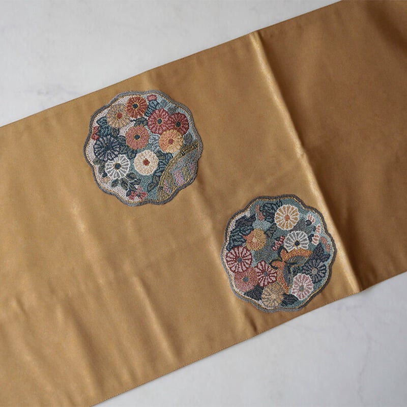 オレンジ色 刺繍入り 袋帯 若
