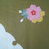 【袷羽織】鶯色　雪輪に桜文　鬼しぼ縮緬　袷羽織