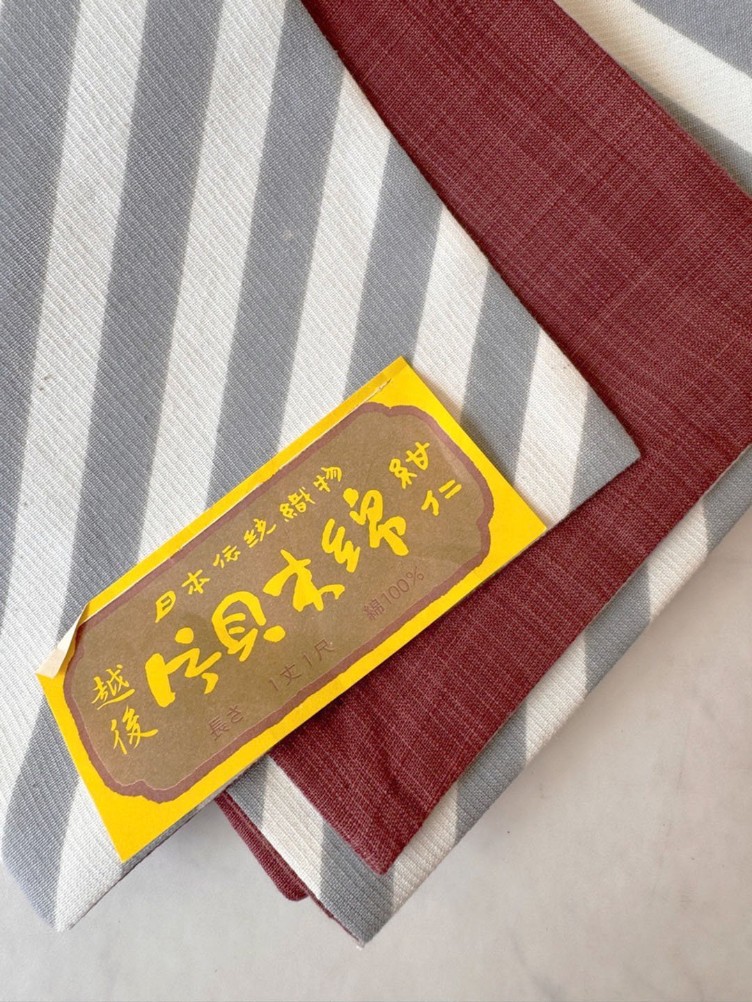 半幅帯】越後型染め片貝木綿 紺仁 鈍色 斜め縞文 半幅帯