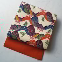 【難あり・なごや帯】　生成り色×朱色系　遠山文　型染め　紬なごや帯