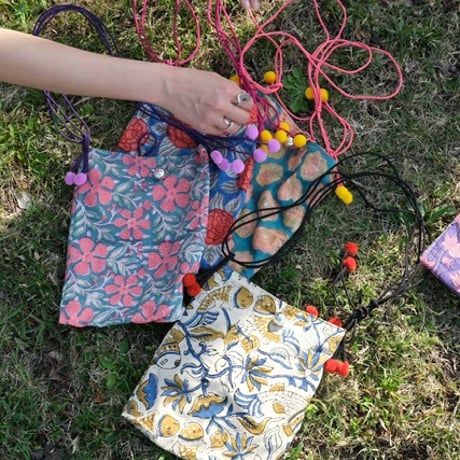handmade pompom pochette