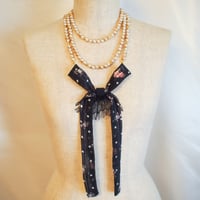 "Journey with Cinders " 2wayリボンコサージュネックレス