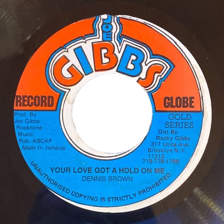 YOUR LOVE GOT A HOLD ON ME / DENNIS BROWN (7インチレコード)
