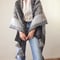 TASSEL PONCHO STALL