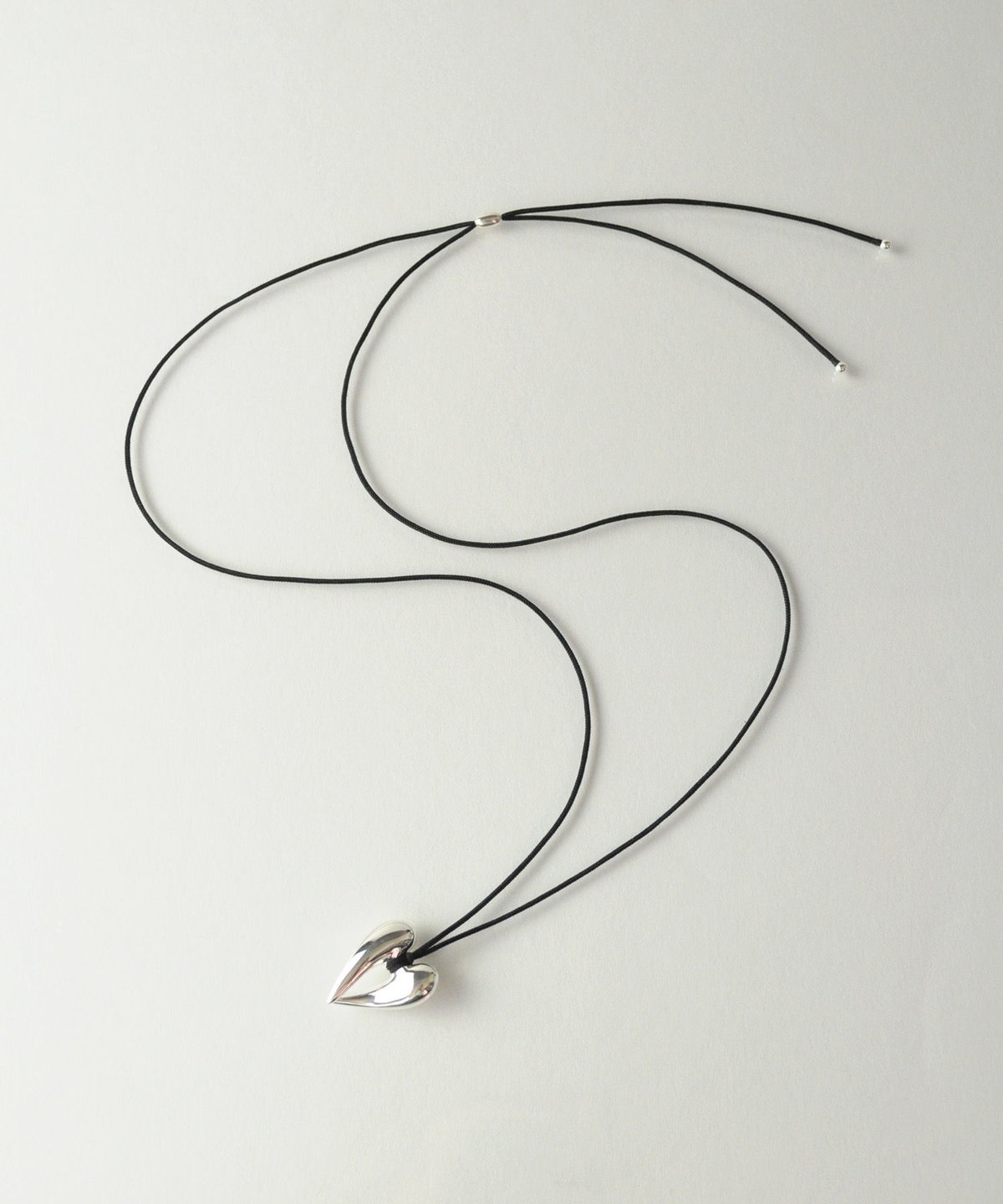 anq.】シルバー925 ハートモティーフ シルクコード ロングペンダント