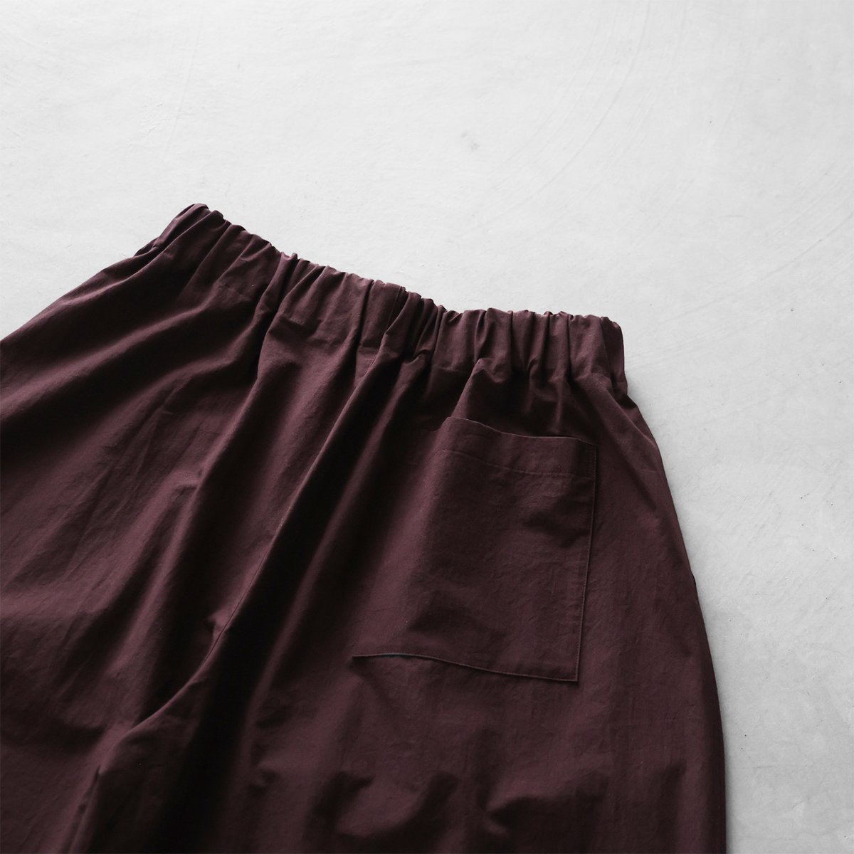 綿ウールタイプライタークロススカートパンツ（ボルドーブラウン