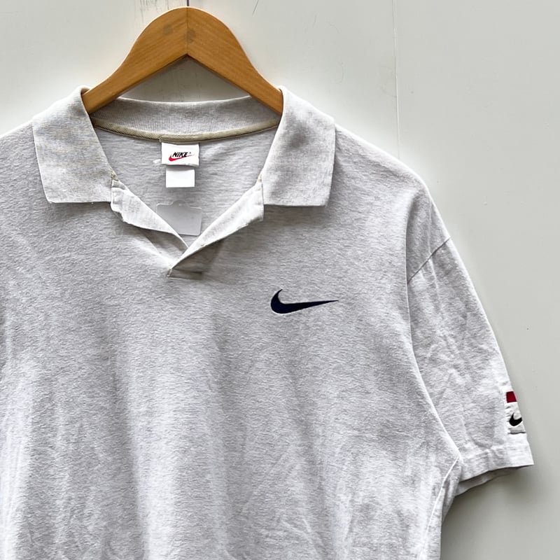 Nike swoosh polo sales