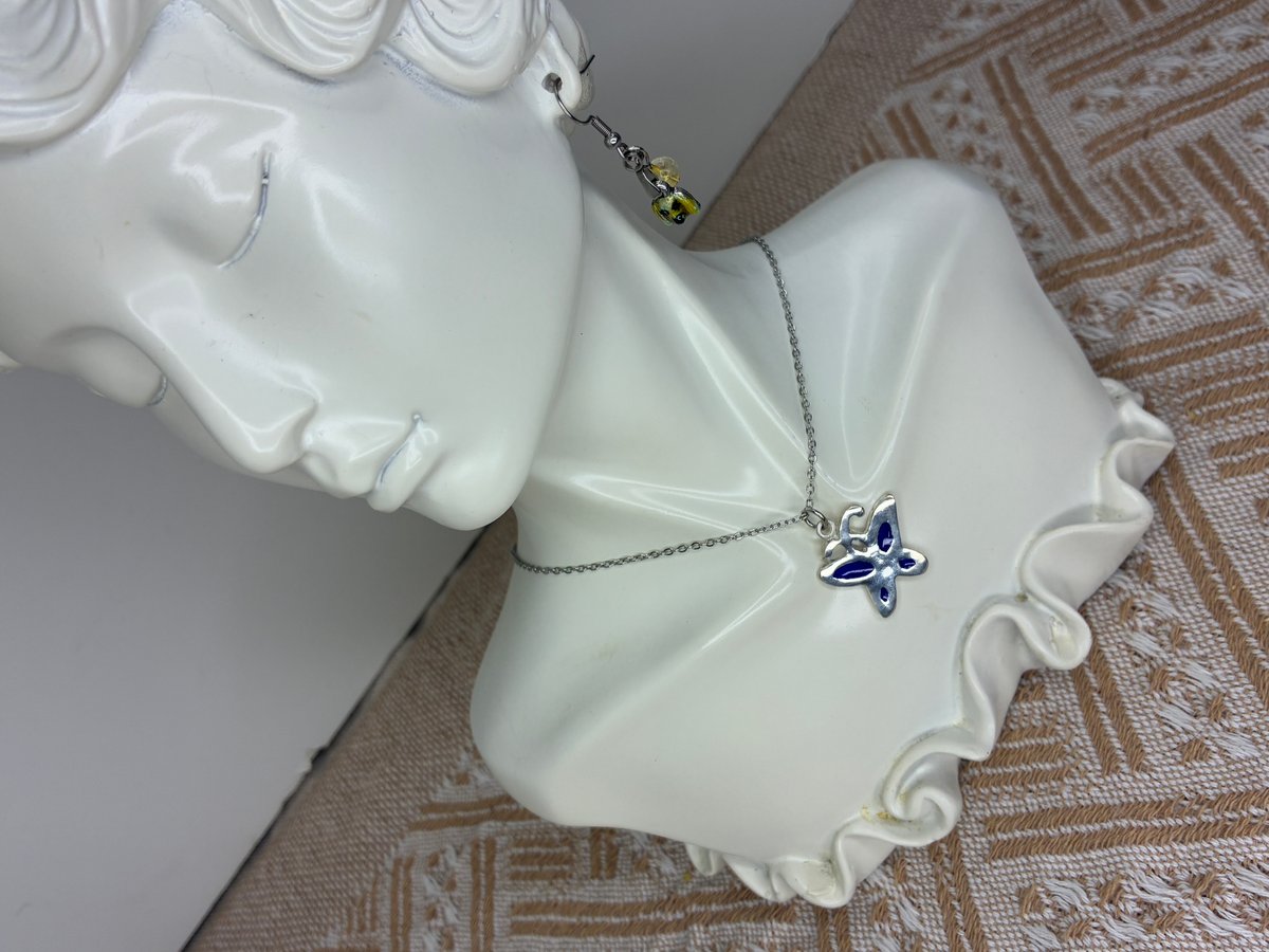 透胎七宝の蝶ネックレス｜ブルー × シルバー｜変化と成長のお守り | WAKACO