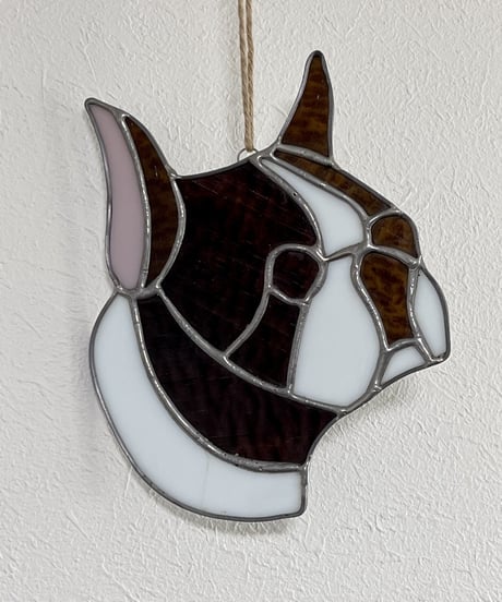 "Bulldog" shaped stained glass.
