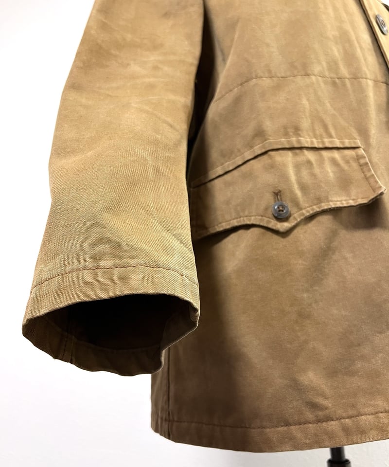 mid 20th c, Cotton canvas hunting jacket. 