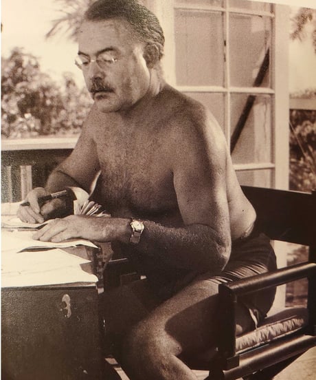 Hemingway AND HIS WORLD.