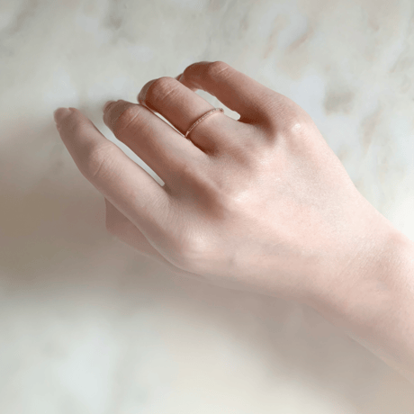 Tiny diamond half eternity ring