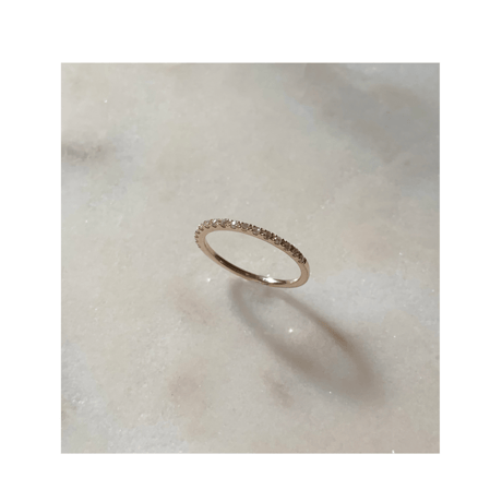 Tiny diamond half eternity ring