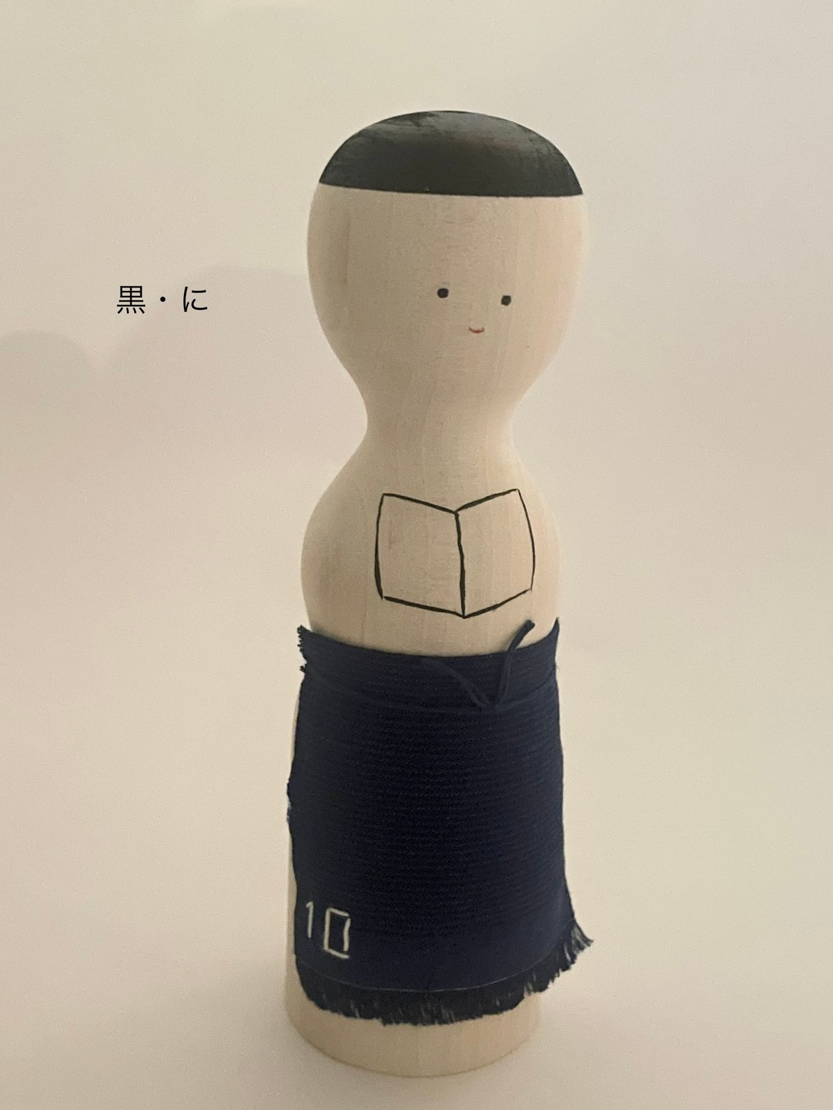 誠光社オリジナルこけし 読む人 | 誠光社 通信販売