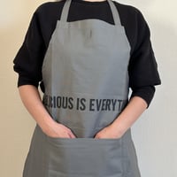 REVERSIBLE  APRON“DELICIOUS IS EVERYTHING/DELICIOUS +SMILE(リバーシブルエプロン)