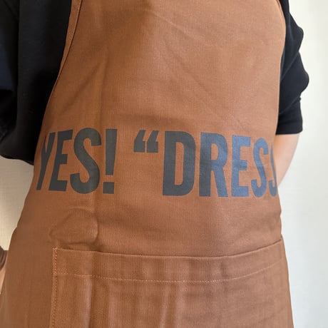 DRESSSEN  DRVBRN9 REVERSIBLE  APRON“THINK BEAUTIFUL/YES！ DRESSSEN    (リバーシブルエプロン)