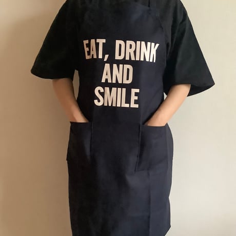 WPDN6   DAY USE W POCKET  APRON   “EAT,DRINK AND SMILE  DARK NAVY