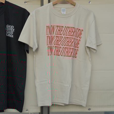 Somewhat beige-ish white, like the hot summer clouds tee