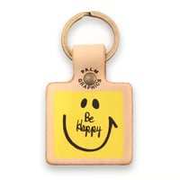 84427 PG　レザーキーホルダー　SMILE