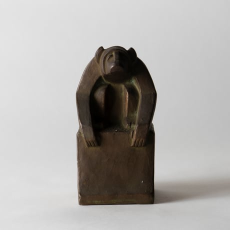 monkey on pedestal