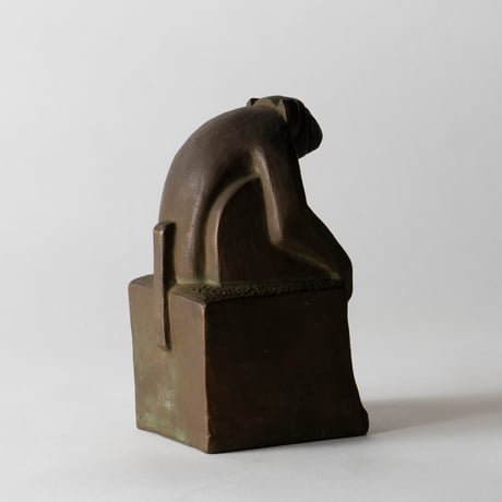 monkey on pedestal
