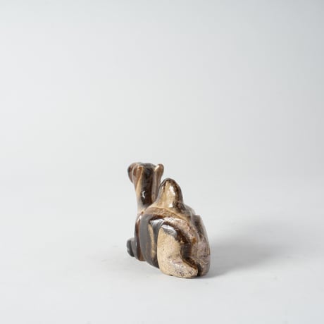 resting stone camel