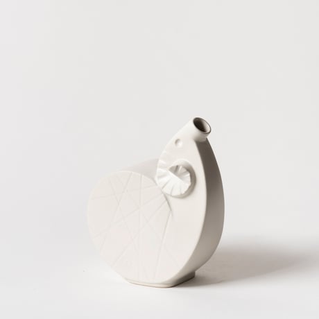 curled sheep vase