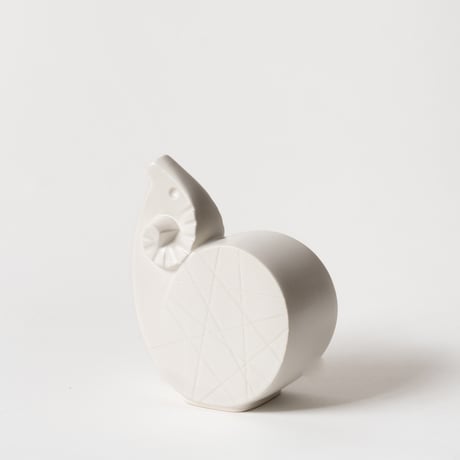 curled sheep vase