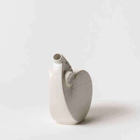 curled sheep vase