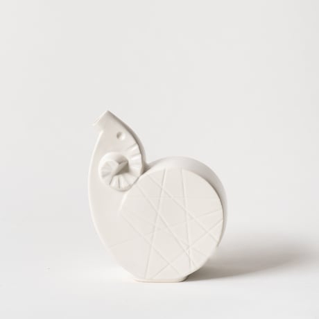 curled sheep vase