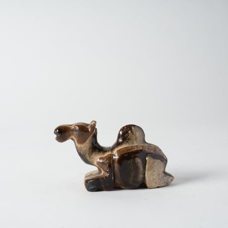 resting stone camel