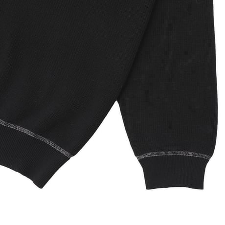 PASSPORT OVERLOCKED ORGANIC KNIT SWEATER BLACK