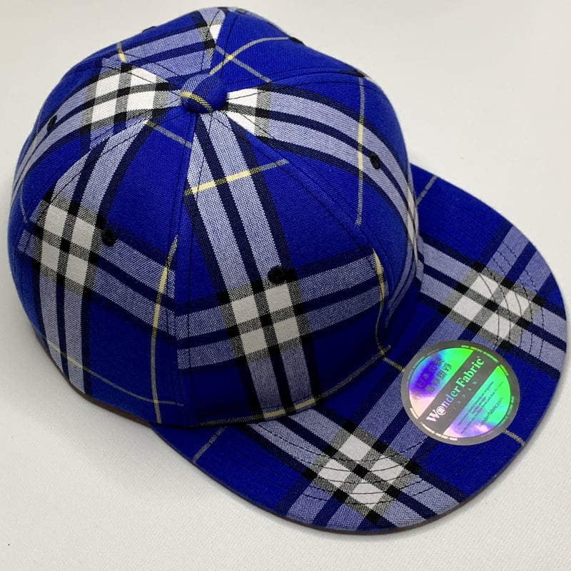 手織り生地で製作した青チェックのベースボールキャップになります