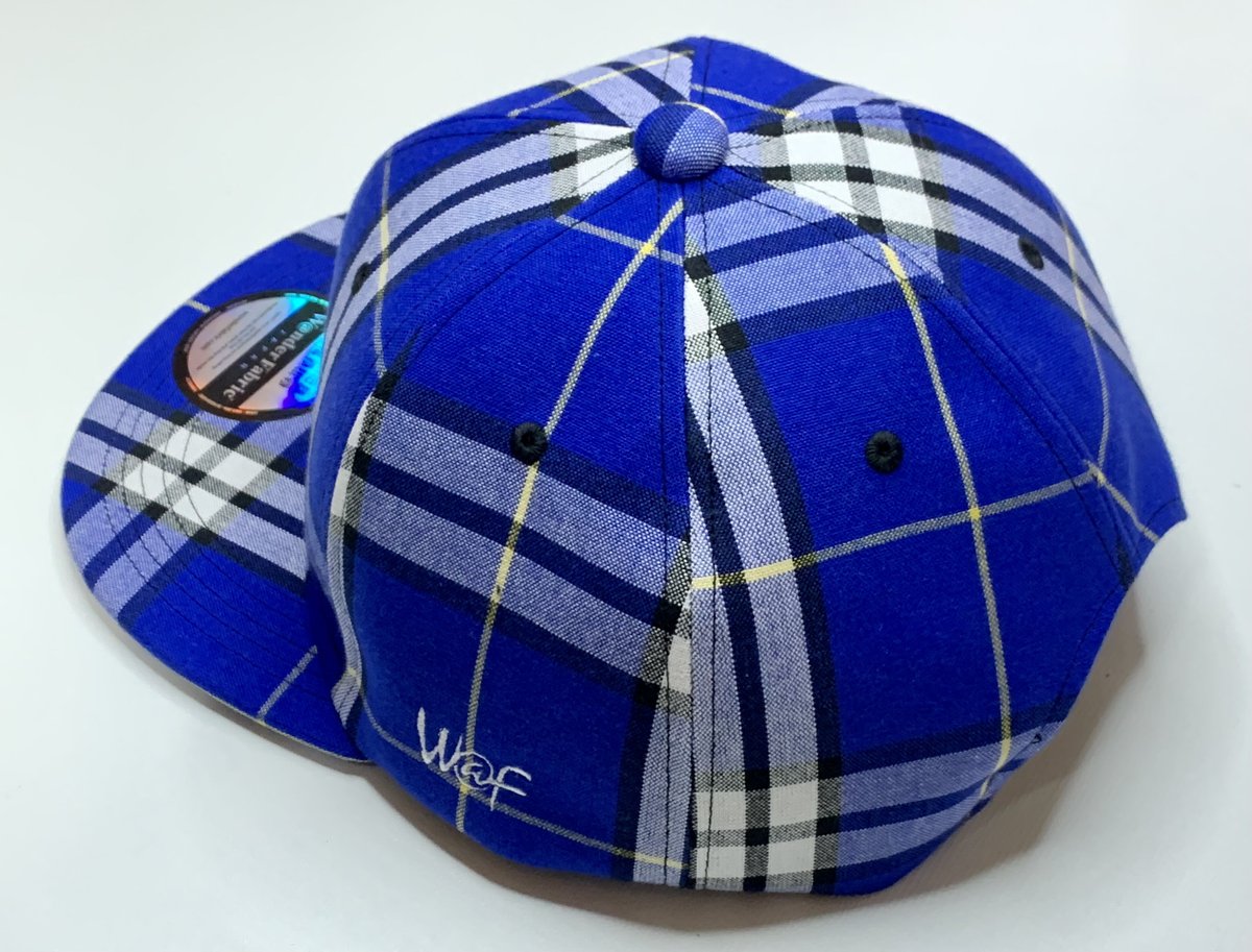 手織り生地で製作した青チェックのベースボールキャップになります