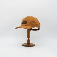 Front name cap