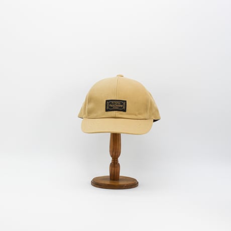 Front name cap