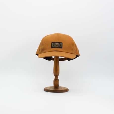 Front name cap