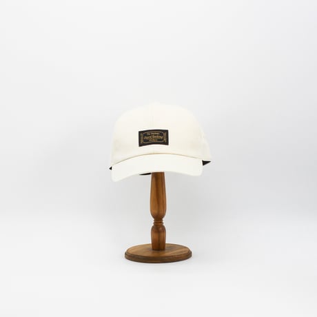 Front name cap