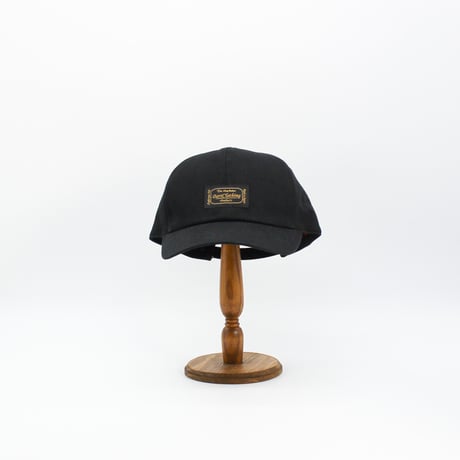 Front name cap