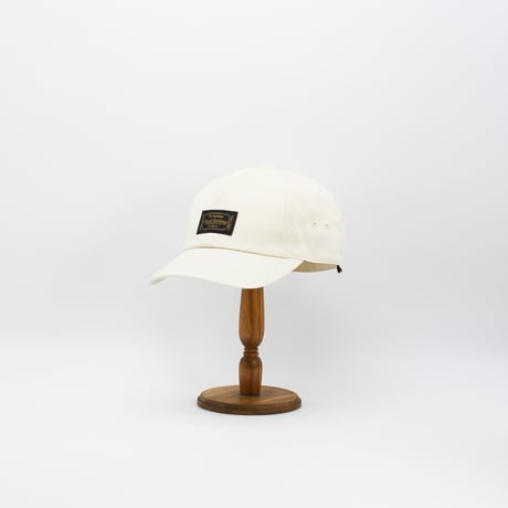 Front name cap