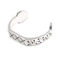 sperm bangle silver