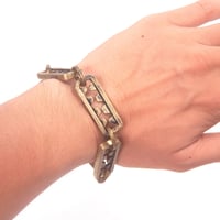 tooth bracelet brass