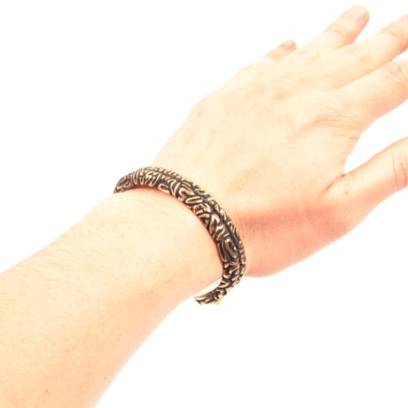 brain bangle brass
