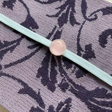 桜色の丸帯留め