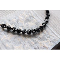 黒のサイコロ羽織紐