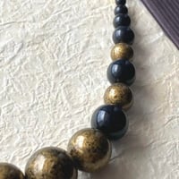 屏風絵を思わせる金雲の男性用羽織紐