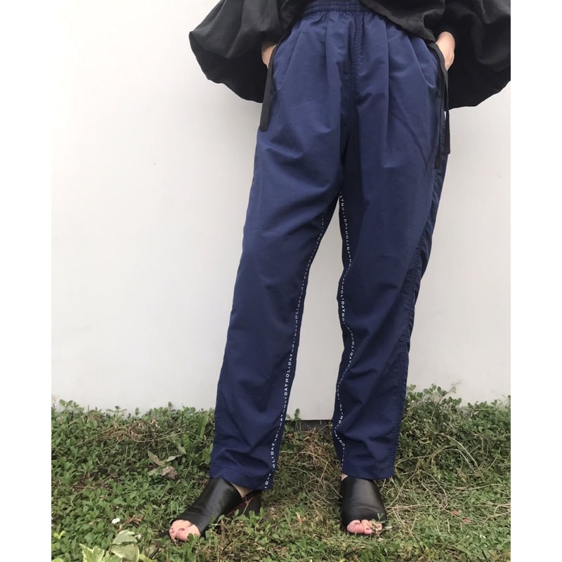 HOLIDAY トラックパンツ HOLIDAY「 LINE HOLIDAY TRACK PANTS」 | gouter le